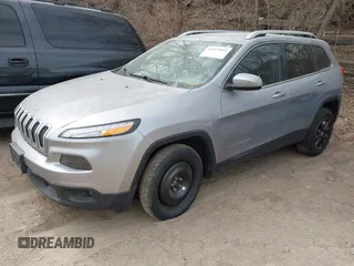 2016 Jeep Cherokee Latitude with VIN 1C4PJMCB7GW252724, listed as a IAAI auction lot 41869060 with 125,119 mi miles. Bid and sale history available at carsss.com. Image 17.