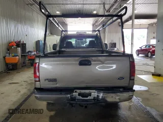2004 Ford F-250 XL with VIN 1FTNF21L74EA64859, listed as a Copart auction lot 60397875 with 268,149 mi miles and Salvage title. Bid and sale history available at DreamBid. Image 6.