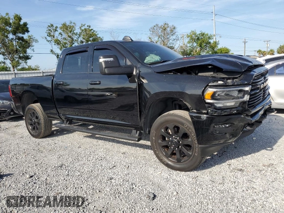 2024 Ram 2500 Laramie with VIN 3C6UR5FL7RG203778, listed as a Copart auction lot 58271405 with 32,057 mi miles and Salvage title. Bid and sale history available at DreamBid. Image 4.