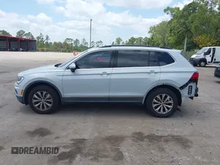 2018 Volkswagen Tiguan SEL with VIN 3VV3B7AX4JM188193, listed as a IAAI auction lot 42107802 with 68,911 mi miles and . Bid and sale history available at DreamBid. Image 14.