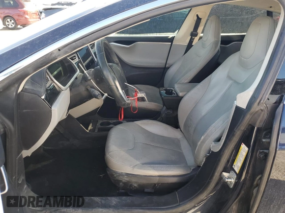 2013 Tesla Model S with VIN 5YJSA1CN9DFP05499, listed as a Copart auction lot 80078144 with 133,763 mi miles and Salvage Title. Bid and sale history available at carsss.com. Image 7.