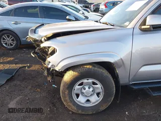 2021 Toyota Tacoma SR z VIN 3TMCZ5AN5MM386394, wystawiony jako IAAI lot #41821364 z przebiegiem 54 070 mil mil oraz . Historia ofert i sprzedaży dostępna na DreamBid. Obrazek 6.