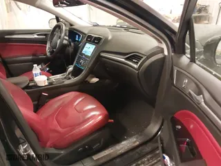 2014 Ford Fusion Titanium Hybrid with VIN 3FA6P0RUXER355654, listed as a IAAI auction lot 41611653 with 211,353 mi miles. Bid and sale history available at carsss.com. Image 5.