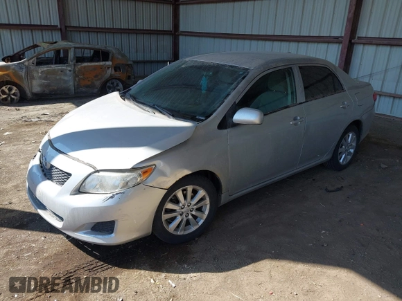2010 Toyota Corolla with VIN 2T1BU4EE0AC269888, listed as a IAAI auction lot 41926103 with 210,787 mi miles. Bid and sale history available at carsss.com. Image 2.