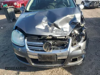 2009 Volkswagen Jetta с VIN 3VWKZ71K99M261433, выставлен на аукционе Copart как лот 82163034 с пробегом 91 035 миль миль и Списание • Salvage title. История ставок и продаж доступна на DreamBid. Изображение 11.