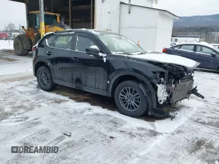 2019 Mazda CX-5 Sport with VIN JM3KFBBM8K1621929, listed as a IAAI auction lot 41356228 with 67,023 mi miles and . Bid and sale history available at carsss.com. Image 1.