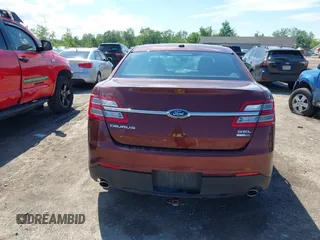 2016 Ford Taurus SEL z VIN 1FAHP2H8XGG136549, wystawiony jako IAAI lot #42338455 z przebiegiem 170 123 mil mil oraz . Historia ofert i sprzedaży dostępna na DreamBid. Obrazek 17.