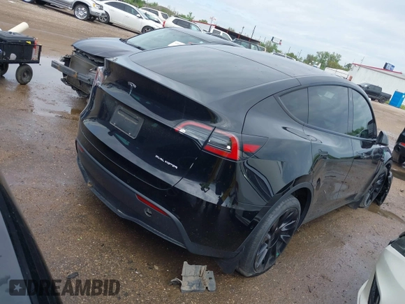 2023 Tesla Model Y Long Range with VIN 7SAYGDEE3PA024315, listed as a IAAI auction lot 41900788 with Not Provided miles. Bid and sale history available at carsss.com. Image 4.
