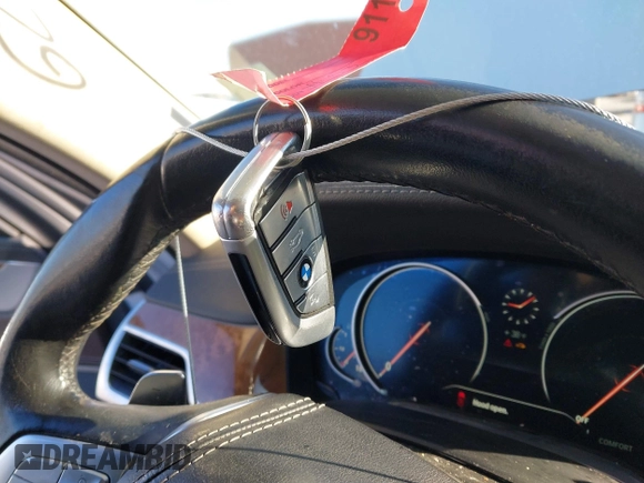 2018 BMW 7 Series 750i with VIN WBA7F0C57JGM23667, listed as a IAAI auction lot 41581035 with 113,140 mi miles and . Bid and sale history available at DreamBid. Image 11.