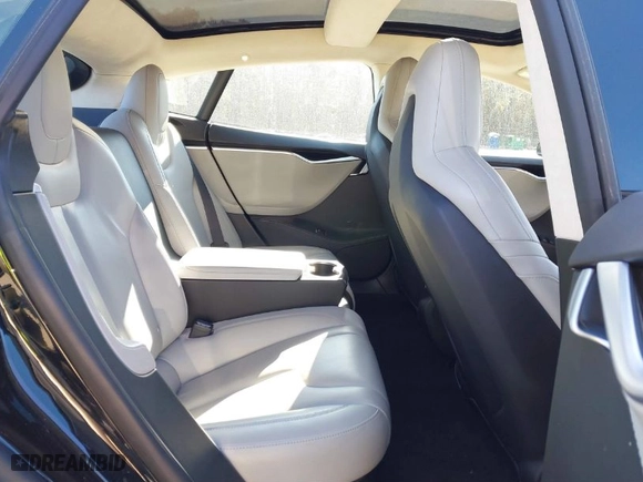 2015 Tesla Model S 85D with VIN 5YJSA4H43FF083602, listed as a IAAI auction lot 41830872 with 67,475 mi miles. Bid and sale history available at carsss.com. Image 8.