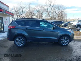 2015 Ford Escape SE with VIN 1FMCU9G98FUA70885, listed as a IAAI auction lot 41608240 with 54,802 mi miles. Bid and sale history available at carsss.com. Image 13.