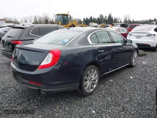 2014 Lincoln MKS EcoBoost with VIN 1LNHL9FT4EG607092, listed as a IAAI auction lot 41483964 with 89,624 mi miles. Bid and sale history available at carsss.com. Image 4.