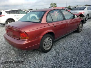 1998 Saturn SL z VIN 1G8ZK5271WZ179625, wystawiony jako Copart lot #50878255 z przebiegiem 180 085 mil mil oraz Szkoda całkowita • Salvage title. Historia ofert i sprzedaży dostępna na DreamBid. Obrazek 3.
