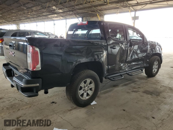 2019 GMC Canyon 2WD with VIN 1GTG5BENXK1239892, listed as a Copart auction lot 79576674 with 87,602 mi miles and Salvage Title. Bid and sale history available at carsss.com. Image 3.