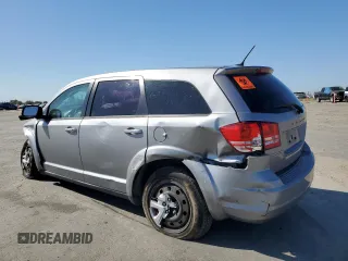 2015 Dodge Journey American Value with VIN 3C4PDCABXFT712192, listed as a Copart auction lot 55680975 with 104,579 mi miles and Salvage Title. Bid and sale history available at DreamBid. Image 2.