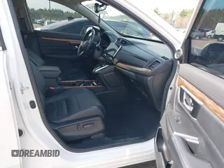 2020 Honda CR-V Touring z VIN 2HKRW2H9XLH623380, wystawiony jako IAAI lot #42039028 z przebiegiem 59 795 mil mil oraz . Historia ofert i sprzedaży dostępna na DreamBid. Obrazek 5.