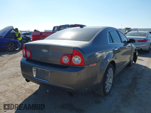 2012 Chevrolet Malibu LTZ with VIN 1G1ZG5E74CF133103, listed as a IAAI auction lot 41640075 with 173,692 mi miles and . Bid and sale history available at DreamBid. Image 4.