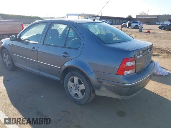 2004 Volkswagen Jetta GL z VIN 3VWRA69M64M044291, wystawiony jako IAAI lot #41882666 z przebiegiem 205 029 mil mil oraz . Historia ofert i sprzedaży dostępna na DreamBid. Obrazek 3.