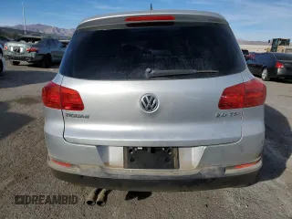 2013 Volkswagen Tiguan S with VIN WVGAV3AX8DW559779, listed as a Copart auction lot 87512845 with 79,169 mi miles and Salvage title. Bid and sale history available at DreamBid. Image 6.