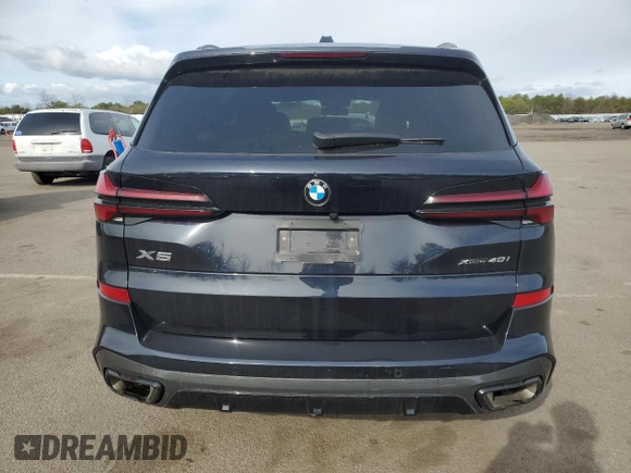 2024 BMW X5 xDrive40i z VIN 5UX23EU09R9S17979, wystawiony jako Copart lot #48359735 z przebiegiem 12 564 mil mil oraz Szkody całkowita. Historia ofert i sprzedaży dostępna na DreamBid. Obrazek 6.