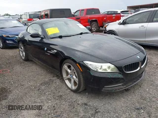 2014 BMW Z4 sDrive28i z VIN WBALL5C58EJ105974, wystawiony jako IAAI lot #42364176 z przebiegiem 101 975 mil mil oraz . Historia ofert i sprzedaży dostępna na DreamBid. Obrazek 1.