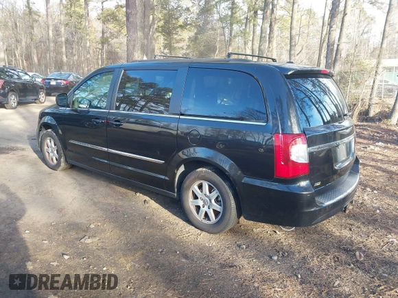 2012 Chrysler Town & Country Touring with VIN 2C4RC1BG0CR212650, listed as a IAAI auction lot 41447272 with 231,658 mi miles. Bid and sale history available at carsss.com. Image 3.