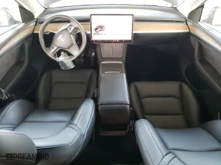 2023 Tesla Model Y Long Range with VIN 7SAYGDEEXPA137582, listed as a Copart auction lot 46869265 with 16,474 mi miles and Salvage Title. Bid and sale history available at carsss.com. Image 8.