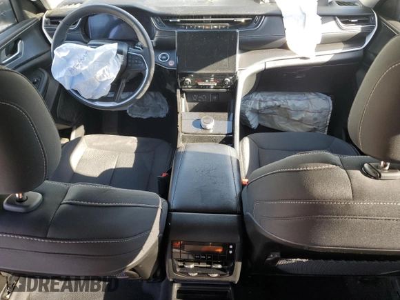 2023 Jeep Grand Cherokee Altitude with VIN 1C4RJJAG5P8883451, listed as a Copart auction lot 52218955 with Not provided miles and Salvage title. Bid and sale history available at DreamBid. Image 8.