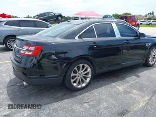 2013 Ford Taurus Limited with VIN 1FAHP2F84DG220283, listed as a IAAI auction lot 40045974 with 155,409 mi miles and . Bid and sale history available at DreamBid. Image 4.