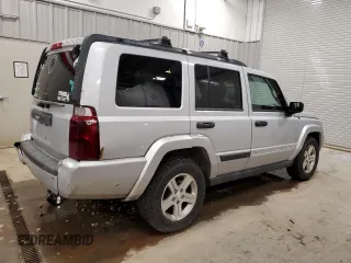 2006 Jeep Commander with VIN 1J8HG48N86C275203, listed as a Copart auction lot 57827085 with 197,552 mi miles and Clean title. Bid and sale history available at DreamBid. Image 3.