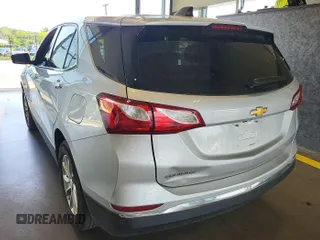 2020 Chevrolet Equinox LT with VIN 2GNAXJEV0L6236404, listed as a IAAI auction lot 42619695 with 77,124 mi miles and . Bid and sale history available at DreamBid. Image 16.