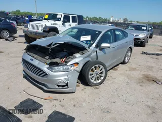 2019 Ford Fusion SE with VIN 3FA6P0LU1KR222141, listed as a IAAI auction lot 42000677 with 122,898 mi miles and . Bid and sale history available at carsss.com. Image 17.