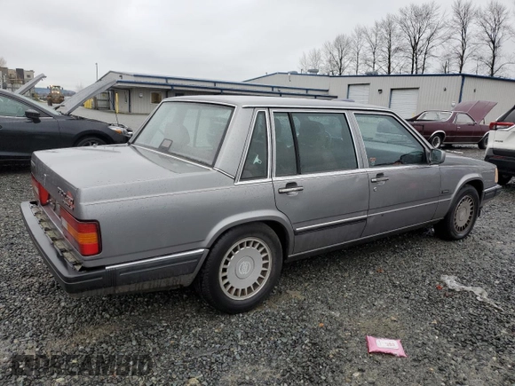 1990 Volvo 760 with VIN YV1GA8740L0089828, listed as a Copart auction lot 84668844 with 272,600 mi miles and Salvage title. Bid and sale history available at DreamBid. Image 3.