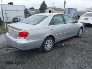 2006 Toyota Camry STD z VIN 4T1BE32K86U157718, wystawiony jako IAAI lot #41805465 z przebiegiem 327 299 mil mil oraz . Historia ofert i sprzedaży dostępna na DreamBid. Obrazek 4.