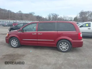 2014 Chrysler Town & Country Touring with VIN 2C4RC1BG9ER418147, listed as a IAAI auction lot 41812594 with 161,356 mi miles and . Bid and sale history available at DreamBid. Image 14.