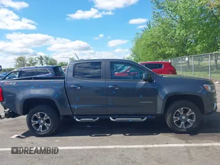 2015 Chevrolet Colorado 4WD Z71 z VIN 1GCGTCE34F1234137, wystawiony jako IAAI lot #42188520 z przebiegiem 205 813 mil mil oraz . Historia ofert i sprzedaży dostępna na DreamBid. Obrazek 13.