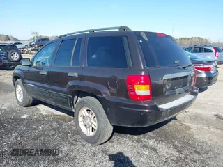 2004 Jeep Grand Cherokee with VIN 1J8GX48S24C266933, listed as a IAAI auction lot 41497122 with 200,899 mi miles and . Bid and sale history available at DreamBid. Image 3.