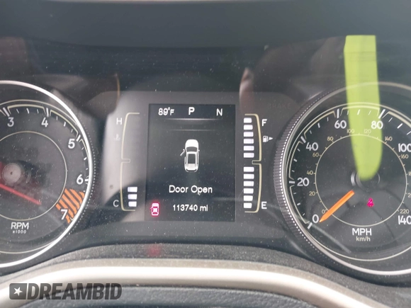 2015 Jeep Cherokee Latitude with VIN 1C4PJLCB5FW689811, listed as a IAAI auction lot 42113567 with 113,740 mi miles and . Bid and sale history available at carsss.com. Image 7.
