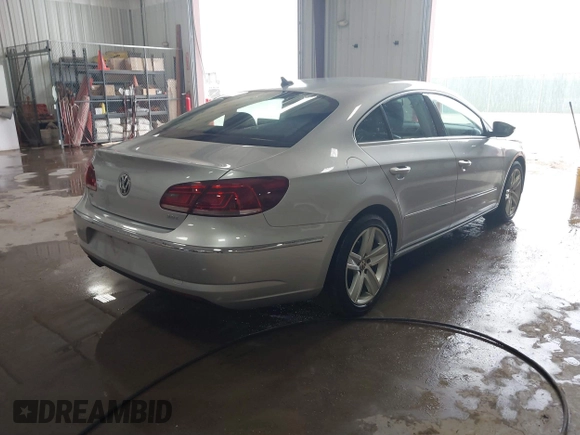 2015 Volkswagen CC R-Line z VIN WVWBP7AN9FE826400, wystawiony jako IAAI lot #40931896 z przebiegiem 117 022 mil mil oraz . Historia ofert i sprzedaży dostępna na DreamBid. Obrazek 4.