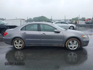 2006 Acura RL z VIN JH4KB16516C012532, wystawiony jako IAAI lot #42095836 z przebiegiem 177 194 mil mil oraz . Historia ofert i sprzedaży dostępna na DreamBid. Obrazek 14.