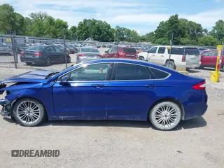 2015 Ford Fusion SE with VIN 3FA6P0H95FR227983, listed as a IAAI auction lot 42532582 with 169,940 mi miles and . Bid and sale history available at DreamBid. Image 15.