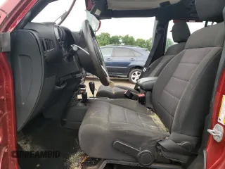 2012 Jeep Wrangler Unlimited Sport with VIN 1C4BJWDG6CL234419, listed as a Copart auction lot 62284825 with 66,649 mi miles and Salvage title. Bid and sale history available at DreamBid. Image 7.