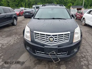 2013 Cadillac SRX Performance Collection z VIN 3GYFNHE39DS642111, wystawiony jako IAAI lot #42470291 z przebiegiem 176 239 mil mil oraz . Historia ofert i sprzedaży dostępna na DreamBid. Obrazek 6.