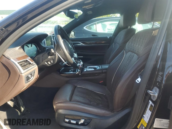 2018 BMW 7 Series 740e xDrive iPerformance with VIN WBA7J2C52JG938439, listed as a Copart auction lot 69452044 with 38,451 mi miles and Salvage Title. Bid and sale history available at carsss.com. Image 7.