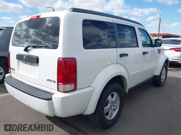 2008 Dodge Nitro SXT with VIN 1D8GU28K98W231848, listed as a IAAI auction lot 41696802 with 94,486 mi miles. Bid and sale history available at carsss.com. Image 4.