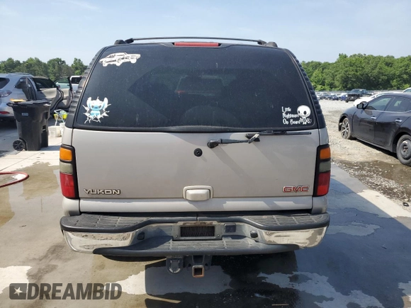 2005 GMC Yukon SLE z VIN 1GKEC13T75J179930, wystawiony jako Copart lot #57259205 z przebiegiem 310 454 mil mil oraz Szkoda całkowita • Salvage title. Historia ofert i sprzedaży dostępna na DreamBid. Obrazek 6.