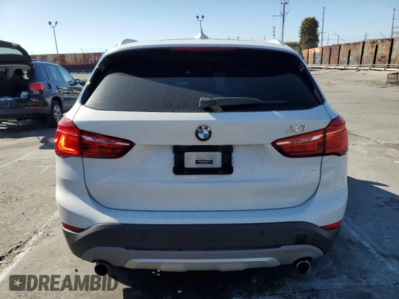 2018 BMW X1 xDrive28i with VIN WBXHT3C34J5K26230, listed as a Copart auction lot 50069465 with 89,520 mi miles and Salvage Title. Bid and sale history available at carsss.com. Image 6.