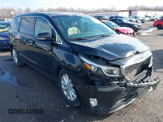 2017 Kia Sedona EX with VIN KNDMC5C18H6260441, listed as a IAAI auction lot 41797159 with 77,309 mi miles. Bid and sale history available at carsss.com. Image 1.