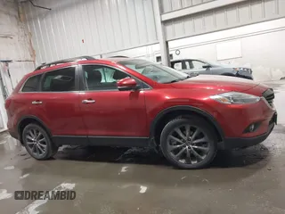 2015 Mazda CX-9 Grand Touring z VIN JM3TB3DAXF0464215, wystawiony jako IAAI lot #42043092 z przebiegiem 119 269 mil mil oraz . Historia ofert i sprzedaży dostępna na DreamBid. Obrazek 13.