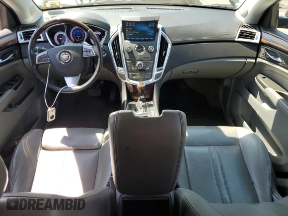 2012 Cadillac SRX Performance Collection with VIN 3GYFNEE34CS590058, listed as a Copart auction lot 54548545 with 122,070 mi miles and Salvage Title. Bid and sale history available at carsss.com. Image 8.